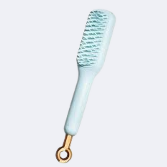 Self-cleaning hairbrush